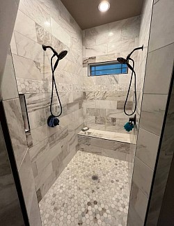 Walk in shower by Elite Tile Xpressions