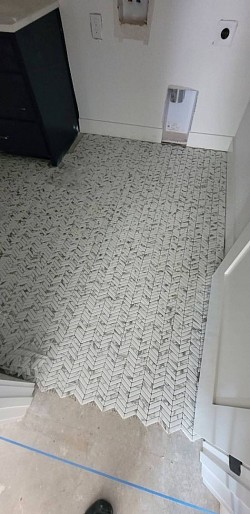 Herringbone pattern Elite Tile Xpressions