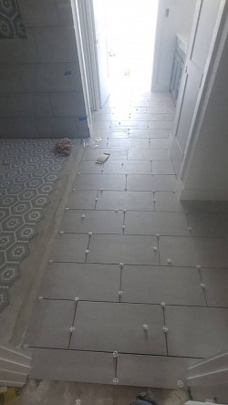 Tile floor by Elite Tile Xpressions