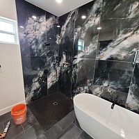 Elite Tile Xpressions 2x4 ft tile in a shower Sherman Tx