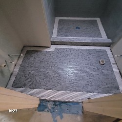 Elite Tile Xpressions Bathroom shower with stripe. Sherman Tx.