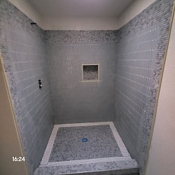 Elite Tile Xpressions picket tile with strip shower tile Sherman Tx