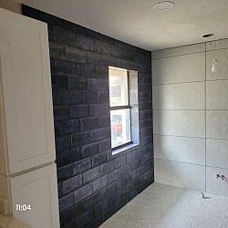 Brick pattern shower tile Elite Tile Xpressions